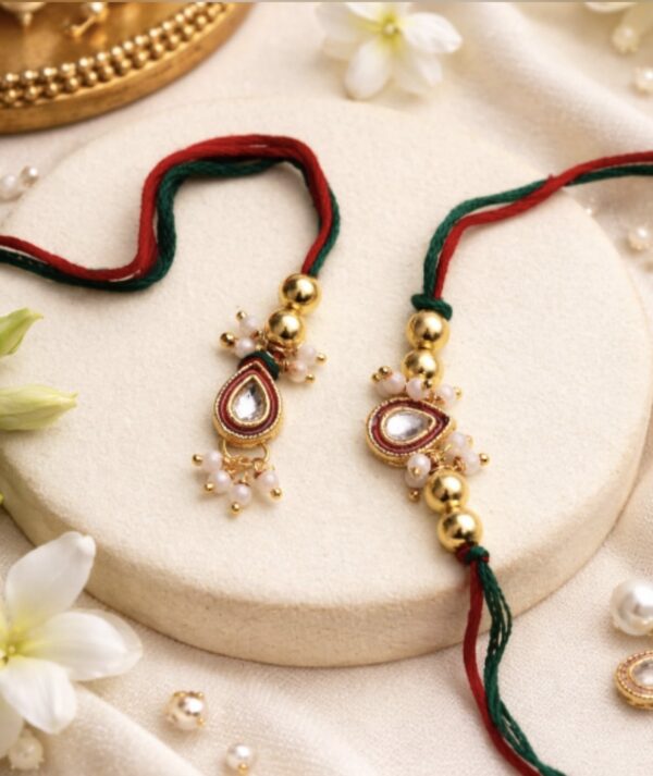 Elegant Red & Green Kundan Drop Rakhi & Lumba Set with Pearl Accents